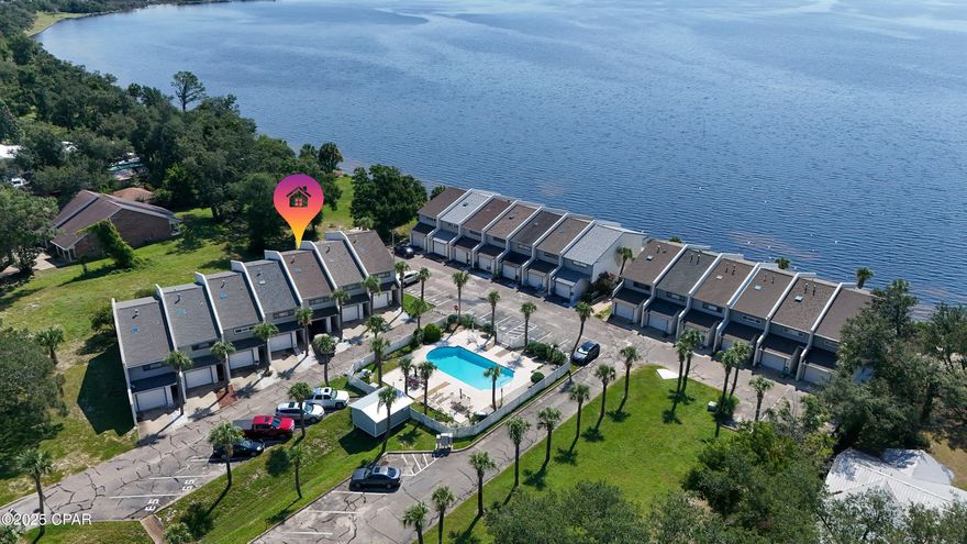 Welcome to year-round resort living in the charming waterfront community of Sunbay! This affordable three-bedroom, two-and-a-half-bathroom townhome offers private beach access, beautiful views of the bay, and the pool. The primary bedroom features a private balcony, and the home includes an attached garage, in-unit laundry, upgraded lighting, stainless steel appliances, and luxury vinyl plank flooring throughout. Freshly painted and ready for new owners, this townhome is the perfect getaway or primary residence. Imagine waking up to stunning bay views right from your bedroom! Start your day with a refreshing dip in the large resort-style pool, or enjoy an evening stroll along the shoreline to unwind. If you love being near the water, this home is an excellent fit for you and your family. Conveniently located near Tyndall Air Force Base, this unit also makes for a fantastic rental opportunity if you're looking for an investment. You'll be within walking distance of numerous shops, parks, restaurants, marinas, and a brand-new public pier just down the road. Don't miss out on this turn-key townhome—it's ready for new owners! Contact your favorite Realtor today for more information or to schedule a showing.