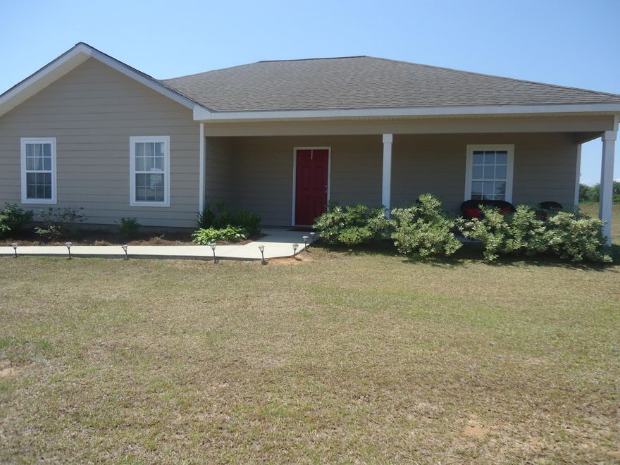 This is an adorable, comfortable, open floor plan with 3 bedrooms and 2 bathrooms, nice kitchen with stainless appliances.  The Living area boasts a cathedral ceiling. The back yard is partially fenced with black chain link fencing. It is located across from the sports complex and close to the high school.  Built in 2011 and taken care of!