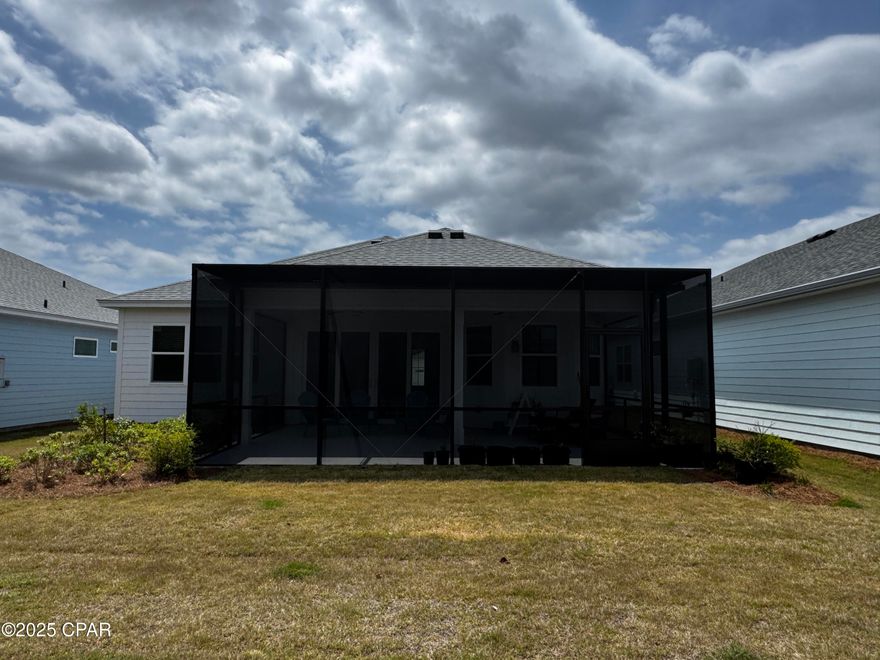 'CURRENTLY UNDER CONTRACT, SELLER WILL CONSIDER BACKUP OFFERS'. LOWEST priced Single Family listed!  Brand new lanai extension and screen installed (see photos). 
Growing Older but not Up?  Embrace the vibrant 55+ lifestyle at Latitude Margaritaville Watersound, where the ''no shoes'' lifestyle awaits you! Introducing this stunning Beach Collection Coconut model, a brand-new single-family home in Phase 5 that is ready for you to call home. With this beautifully designed 3-bedroom, 2-bath residence, you'll enjoy stylish features including 8' doors, a sleek glass impact front door, and elegant Level 2 White kitchen cabinets paired with exquisite Sugar White Quartz countertops. Experience the perfect blend of comfort and style with faux wood blinds and durable laminate flooring throughout. Step outside to your expanded concrete lanai (screening is scheduled for installation), where you can unwind while soaking in the serene views of the pond. Don't miss your chance to live your best life in this incredible community! 
Elevate your living experience to new heights as Latitude Margaritaville is the most sought after 55+ community in the country right now with unmatched amenities including a private restaurant with 3 bars, resort pool, live music daily, pickleball, bocce ball, cornhole, putting green, Fins Up Fitness Center, indoor lap pool & whirlpool and a full lifestyle staff who dedicate their days to ensuring your fun! Phase 2 of the amenities has broken ground and includes a full size theatre, Barkaritaville dog spa, woodworking shop, pottery room, business center and community rooms for clubs, groups, tastings and food demonstrations. The public retail has also begun with the golf cart store in full swing, Capital City Bank is about to open and anticipating the grocery store, restaurants and other boutique shopping soon as well as the Public Marina...all through St Joe!