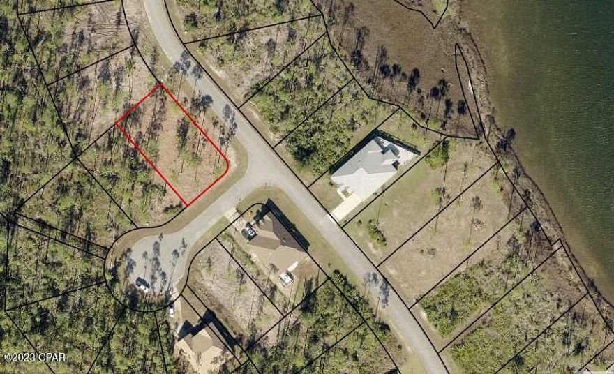 Here is the perfect location to build your dream home in a gated community! This large corner lot is at the end of a cul-de-sac and is located close to the water. Laird Point is located near to Tyndall Air Force Base as well as restaurants and shopping centers and 30 minutes to Panama City Beach or Mexico Beach.