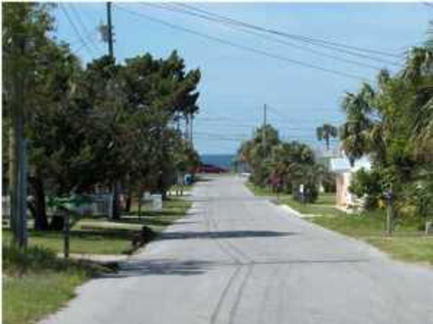Just two blocks from DEDICATED beach! Lot is cleared and ready for your coastal cottage.
