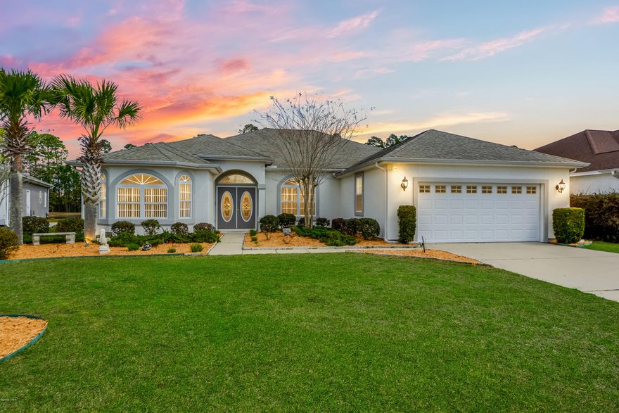 Wonderful Custom Built 4 bedroom 2.5 Bath home in sought-after Hammocks Subdivision.  This Lynn Haven Home features 10” Ceilings, Tile Flooring, Crown Molding, Arched doorway, two Electrical Fireplaces, split Floor Plan, Formal Living Room, Large Dinning Room, Solid Surface Countertops, Enormous Kitchen with Island and Walk-in Pantry. The Master Bedroom boast a huge walk-in closet, Tray Ceilings and the 2nd bedroom is accessible by a pocket door.  Making it perfect for a nursery for a new born. The Master Bath includes Double Sinks, Whirlpool tub and a separate shower. The home overlooks a picturesque pond, huge screened porch to enjoy the view, built in intercom system with front porch camera, ADT Security System, wired for a built in home generator, beautiful Landscaping with automatic Sprinkler System and a 2 Car Garage. The Hammocks is a Wonderful community for the active family.  Sidewalks throughout, Community Pool, Walking Distance to two schools and close to entertainment, dining, Medical Facilities and Shopping.  If you are Looking for a Wonderful Home in a Great Neighborhood, you will want to put this one on your list.  Call your agent today to schedule a viewing.  All Ages, Measurements and Room Sizes are Approximate. Please Verify if Important.