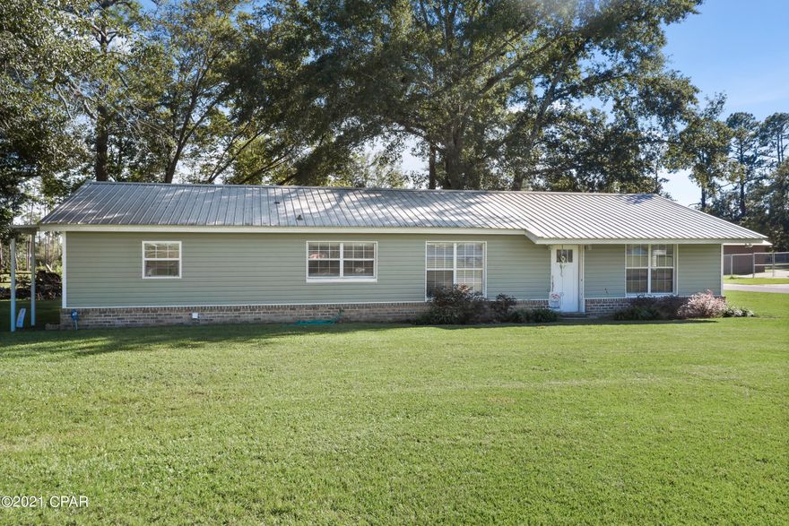 This charming 3-bedroom, 2 bath home is full of character and a must see! Inside you are greeted with luxury vinyl plank flooring, a spacious living room that flows into the beautifully remodeled kitchen/dining area featuring breakfast bar, island and an abundance of cabinetry. The spacious master suite boasts a walk-in closet, double vanity, soaking tub and separate shower. Outside features include a fenced backyard, open deck and storage shed. Home is situated on a large corner lot, a short drive to schools, shopping and restaurants