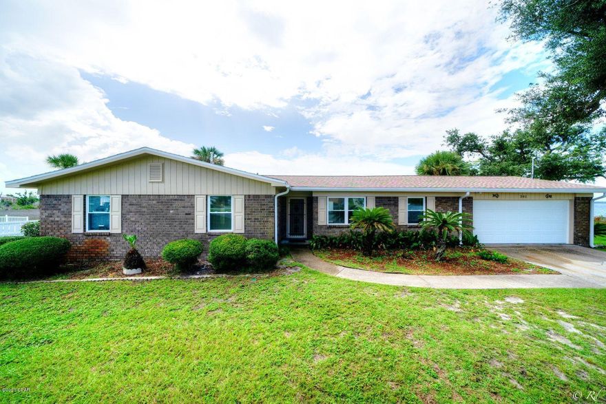 Beautifully remodeled 3 bed, 2 bath waterfront home on a quiet cul-de-sac near TAFB. Enjoy stunning, panoramic views of East Bay on the newly built large, open deck in the backyard. Views of the Bay are also enjoyed from the living room and master bedroom. This home is welcoming with an open living room, dining area, and kitchen floor plan allowing you to host friends and family without missing a beat. The main area of the home features beamed ceilings, a gas fireplace, a coat closet, and Hurricane proof sliding glass doors that lead to the deck. The kitchen is equipped with brand new stainless appliances, granite counter tops, white shaker cabinets, and an island with a breakfast bar. The spacious master bedroom provides peaceful views of the Bay and also has sliding glass doors leading to the deck. The master bedroom is equipped with a private en suite featuring a double vanity with granite counters and shower/tub combo. The guest bedrooms share a guest bathroom that also has granite counters and a shower/tub combo. This home has many upgrades including a new roof, HVAC, Hot Water Heater, Energy-efficient windows, attic insulation, flooring, paint, and appliances. The utility room is large with cabinets and a counter for extra storage space. The garage is equipped with a new electric wind resistant door. This property offers access to the Bay in a paddle boat. The canal is perfect for fishing, crabbing, kayaking, paddle boarding and boating. Access to East Bay. This home is located near TAFB, schools, parks, public boat ramps, shopping, restaurants, and more.