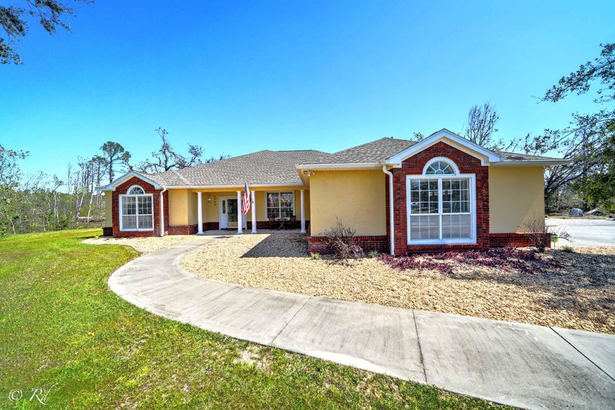 NO HOA!!!  Gorgeous family-friendly cul-de-sac custom built 4 bed, 2 1/2 bath home with 6'' crown molding offering a split bedroom design and expansive sun room. Well designed for entertaining featuring gas fireplace, lights on dimmers, huge open kitchen, custom wood cabinets, wet bar, large rooms, his/her walk-in closets, hard wired speaker & security system, master bath double shower heads, whirlpool tub and a 600ft Artisian well with no iron discoloring the property. NEW roof, NEW paint, NEW well bladder, NEW HVAC blower motor, NEW garage doors, NEW stove, NEW microwave, NEW dishwasher, remodeled deck, and NEW carpets in the bedrooms/sunroom. The driveway can accommodate Boat or RV.