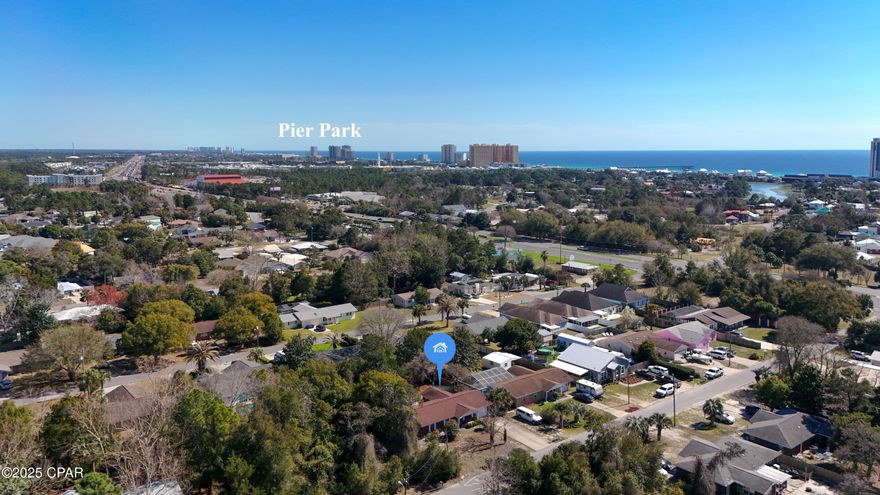 This charming 3-bedroom, 2-bath home welcomes you with a small front patio and enter through an etched glass door,

You'll love the bright and airy layout featuring vaulted ceilings, an eat-in kitchen with plenty of space to add an island or peninsula, and a spacious sunroom overlooking the large backyard and patio — perfect for relaxing or entertaining.

The master suite includes an ensuite bathroom with a walk-in shower, while the hallway bathroom offers a tub. The home also has a one-car garage with washer/dryer hookups, a split-bedroom floor plan for privacy, and newer roof, AC, and water heater — all the big-ticket items are already taken care of.

Unbeatable Location!
Located in one of Bay County's most convenient spots, this home is just an 18-minute walk or 3-minute drive to Public Beach Access 64. Head south on Hwy 79 and you're at the world's most beautiful beaches in minutes, or go north for a straight shot to ECP airport. Just two miles east is Pier Park, the new Dolly Parton's Pirate Show, Top Golf, shopping, and endless dining options. Prefer a slower pace? Drive west and you'll be on scenic 30A in under ten miles, with destinations like Alys Beach right down the road.

This one truly checks all the boxes — stylish updates, smart layout, newer systems, and a prime location with no HOA. Don't miss your chance to make it yours!