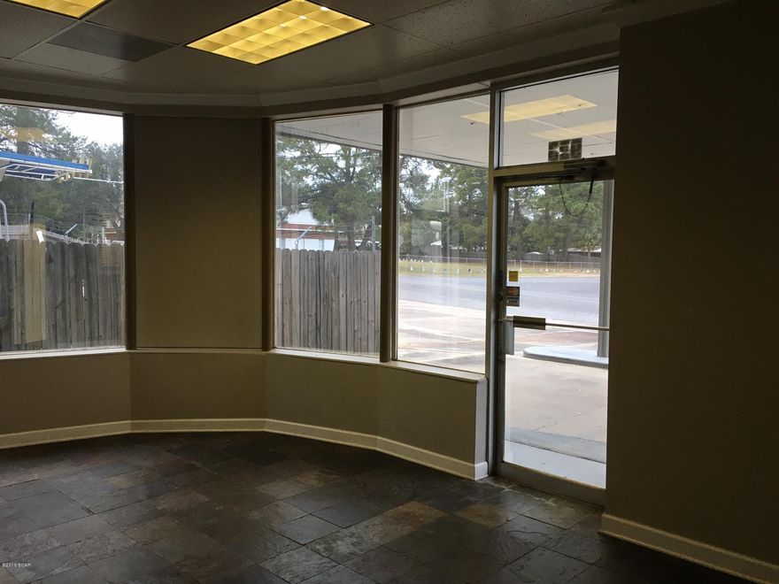 Professional Office Space in the Cove! Space includes lobby, 2 restrooms, kitchen, workroom, and 4 offices.

RENT INCLUDES THE PARKING/STORAGE SPACE IN THE FENCED YARD ON THE CORNER (some of it covered) WITH 30DAYS NOTICE TO CURRENT TENANTS TO VACATE. Would make a great place for business that has construction, transportation etc. equipment to park.