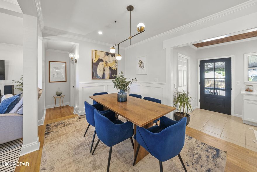 Finally - a Cove home that HAS IT ALL! 9' ceilings in the primary suite with TWO walk-in closets, a walk-in butlers pantry and wet bar, oversized living room, 3 FULL baths. Literally, everything! 

Step into the charm of The Cove—where tree-lined streets, covered porches, and coastal living blend seamlessly with character and charm. Thoughtfully renovated, this 4-bedroom, 3-full bath home at 2,174 square feet captures every box on your list and then some. 

Beautifully reimagined, this open-concept living space showcases the original oak hardwood floors, abundant natural light, and new lighting throughout. Custom built-ins and an expanded living area create the perfect setting for entertaining, while the open flow between the kitchen, living, and dining areas offers a seamless, inviting atmosphere. The kitchen is a showpiece with new custom cabinetry, quartz countertops, stainless appliances, modern backsplash, and a butler's pantry that only DREAMS are made of! This walk-in butler's pantry features floor to ceiling cabinetry and doubles as your dream entertaining station just off the covered back porch—complete with wet bar, drink fridge, and coffee bar!

One of the best features of this home is the primary suite! Boasting 9' ceilings (a rare find in the Cove!), this suite a is a true retreat, offering TWO full size walk-in closets, new carpet in the bedroom, French doors to the covered patio, a large-modern soaking tub, walk-in tiled shower with seamless glass doors, modern fluted double vanities, fluted linen tower, and brushed gold lighting. 

Every detail was considered for modern function and refined style of this retreat and with its split floor plan - this space has everything that other Cove homes do not! 

This home features 3 FULL baths which is a rare find in the Cove. Convenient for guests or for families that don't want to share, you'll love this feature! With 3 guest bedrooms and 2 guest baths, this is a great layout with large closets and renovated baths. The layout was reimagined with a large covered porch off the Butler's pantry area and a back yard with a privacy fenced and a sliding gate for easy access to the alley. This back yard offers 50-amp power and sewer cleanout, great for RV hookup and a slab for a shed or garage with electrical already to it. The driveway is extended with pavers for easy storage for a golf cart or bikes and plenty of parking. 

This home offers updated plumbing (and updated sewer line to the road), updated electrical, November 2018 roof, new doors and windows, irrigation, sod and so much more. 

This home blends history and heart with the modern updates in the Cove. With it's proximity to Downtown Panama City, this is one of the area's most beloved neighborhoods. Walk or golf cart to parks, the marina, and downtown restaurants...because life in The Cove is meant to be enjoyed.