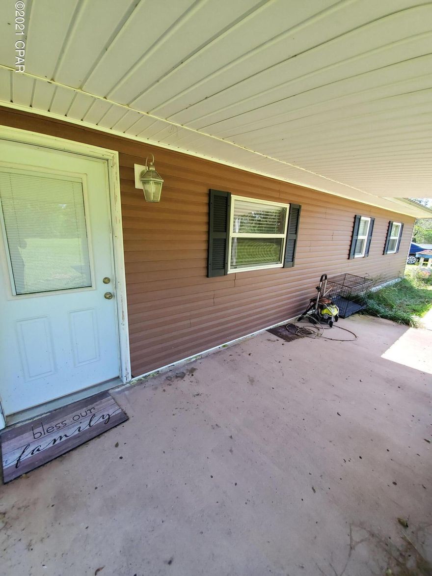 CURRENTLY UNDER CONTRACT, SELLER ACCEPTING BACKUP OFFERS.  Bristol FL home near schools with a large, ,about 2,500 shop on property with almost 2 acres.  If you want an in town home with land and its own shop this is the one for you.  The home is located only about 2 minutes from Tolar Middle School and less than 5 minutes from the newly constructed high school.  The Apalachicola River boat ramp is about 10 minutes away and National Forest is only about 15 minutes away.  This home has all you could need and is super convenient to everything Bristol has to offer.