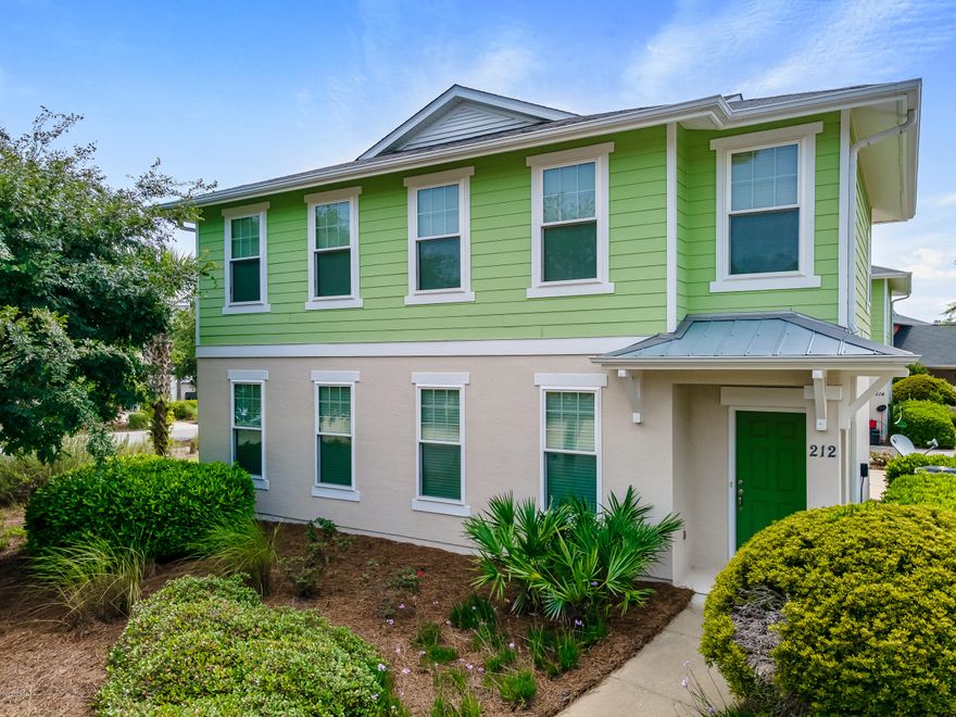 'CURRENTLY UNDER CONTRACT, SELLER ACCEPTING BACKUP OFFERS. This villa located on a corner lot with a greenspace next to it. This coastal style villa is in immaculate condition and move in ready! This home has been beautifully updated with wood floors, crown molding, stone backsplash and granite counter tops throughout the home. Upstairs features a 12x12 loft area. The master bedroom/bathroom has it all! Huge walk in closet with 2 large windows, separate soaking tub, standup shower, linen closet and toilet closet! Stainless steel appliances, open living plan and lots of natural light makes this feel like a home and not a Villa. The exterior features a 2 car garage, screened in porch and fenced in yard. The villas are built with concrete block construction, hurricane impact doors and windows The HOA covers all yard maintenance including watering the lawn and the community pool!