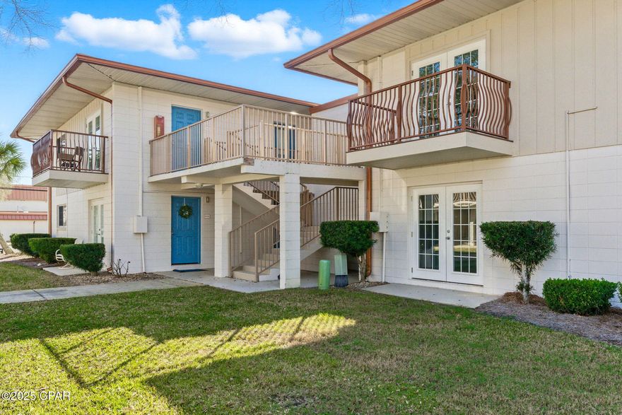 MOVE-IN READY second story condo overlooking the beautifully landscaped courtyard at Landmark Condominiums- a Waterfront community in St Andrews.  Freshly painted with new vinyl plank floors throughout, this condo would be perfect for a second home or investment property.  Enjoy a short walk under the beloved oak trees to Historic Downtown St Andrews or a short bike ride to the revived Downtown Panama City.  While at Landmark, enjoy 2 community pools, a dock, fitness room and a covered pavilion with gas grills.  Call your agent and schedule a private tour today!
