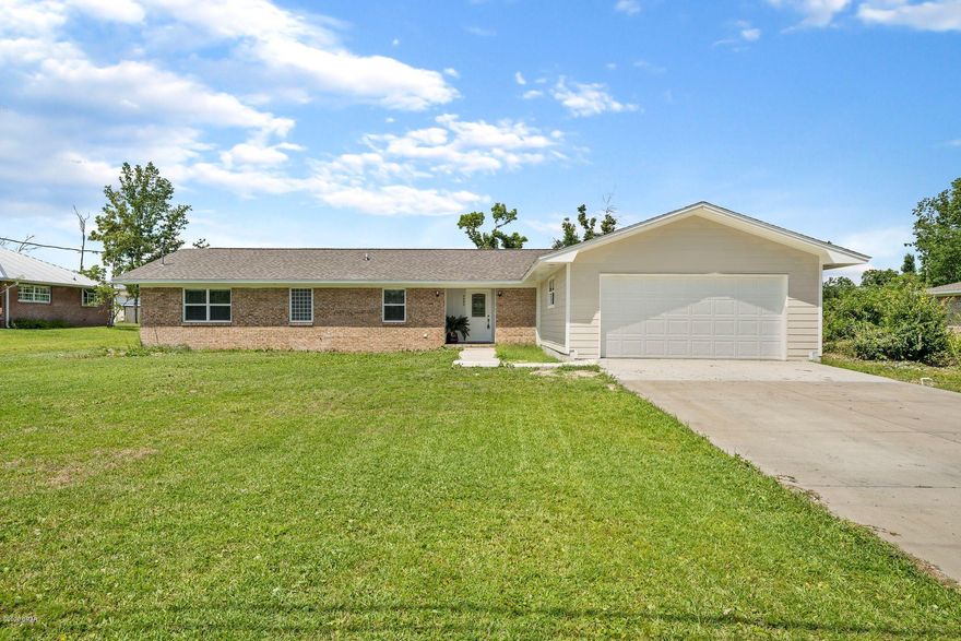 SELLER SAYS SELL NOW! $50K OFF ORIGINAL PRICE.  Need Extra Space?..Then this beautiful home is for you. This amazingly renovated home sits on almost a 1/2 acre of land and is ready for a new family. The kitchen is beautifully remodeled with new quartz counters, stainless appliances and features an eating bar. Meander down the hallway and you will find 2 large bedrooms along with the hall bath. At the end of the hallway is a HUGE master bedroom and bath with his and her closets. The Master bath features a double sink vanity, an over-sized soaking tub and an equally large separate shower. There is also an office and a Florida room off the living area that overlooks the backyard. All of this and still close to town as well as Tyndall AFB and the Bay. Don't delay on this one