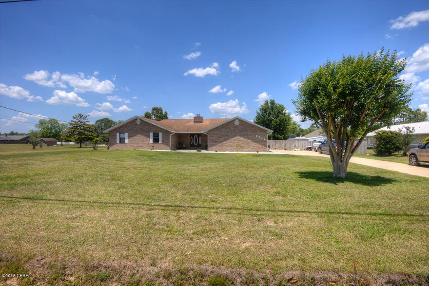POOL HOME ON 1/2 ACRE! You will fall in love with this updated all brick 3 bedroom, 2 bath home conveniently located close to schools, just 20 minutes to Tyndall AFB, only 10 minutes to the Panama City Mall. The kitchen features granite counter tops, stainless steel appliances, double oven and Jenn Aire cook-top. The dining area has french doors leading out onto the expansive pool patio complete with a fire pit and grilling area, perfect for entertaining your friends. Another set of french doors leads you back into the large living room complete with vaulted ceilings, exposed beams, and a fireplace. The Master Suite is large enough for a sitting area and a king sized bed, double vanities and an ample walk-in closet in the master bath round out this well designed retreat. Many other upgrades to this home including: new carpet in the all bedrooms, wood-look luxury vinyl plank in the living area(2012), new water heater in 2015, new gutters in 2018. This beautiful home has ceramic tile in all bathrooms, and 18" ceramic tile in the kitchen and laundry. There are 3 public boat launches, 2 fresh water and 1 saltwater just minutes away, and plenty of room for your boat at the house. Schedule your showing today!