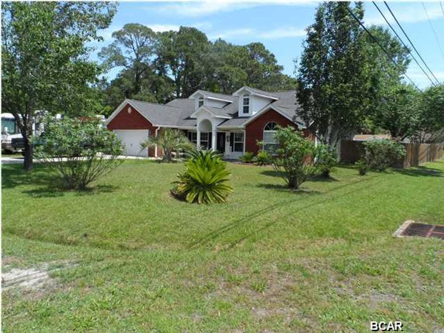 Put this home on your ''must see'' list. If you enjoy having a beautiful, well planned home that is built for entertaining AND has lots of outdoor living space and extra storage, this is the home for you. Quality, style and high efficiency all wrapped up in this custom built 4 bedroom, 2 bath home with an INGROUND SALT WATER POOL. The interior custom touches include an open concept kitchen, breakfast area and family room with gorgeous 18 '' ceramic tile floors, large pantry, solid surface counter tops, and stainless steel appliances. The master bedroom is on the opposite side of the family room and has a luxurious bathroom which includes a corner jetted garden tub, walk in shower, his and her vanities, and water closet. The three remaining bedrooms and bath are on the opposite side o