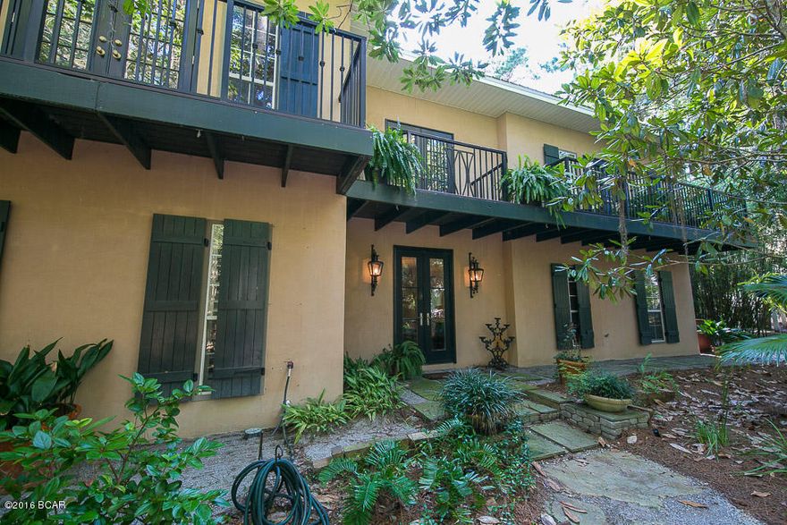 This beautiful home sits on a .55 Acre lot in the secluded Shallows Subdivision, steps away from deeded Bay access. West of Historic Eden Gardens in Point Washington, this property is surrounded by Oak, Magnolia, and Bamboo Trees. The split level home boasts 4 Bedrooms and 3 baths, with an office, multiple dens and a laundry room on both levels. Home Has been upgraded with a list of improvements including: New Roof,sheathing and hurricane clips, new AC condensing unit, balconies replaced with Trex, and The Downstairs was remodeled with an additional bedroom and utility room. A Brand New Washer and Dryer was Purchased May 2016 and is included with Home. The only exclusion is the dining room chandelier(with candles) sitting across from the kitchen. Sellers willing to replace this.