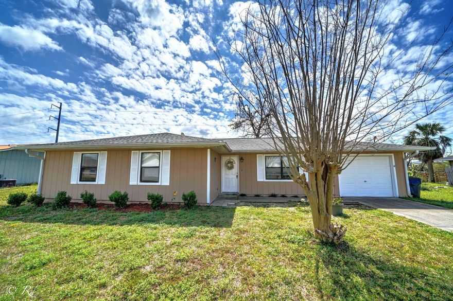 CURRENTLY UNDER CONTRACT, SELLER ACCEPTING BACKUP OFFERS. Move in ready home that is priced right and ready to sell.  Brand new paint through out  in beautiful pastels and light grey.   

This 3 bedroom/ 2 bath home has a large living area, kitchen with stainless appliances, tile and new grey vinyl plank  flooring and new grey carpet in the bedrooms. Spacious bedrooms and open floor plan.   A new roof was just installed.  Home is centrally located near the popular St. Andrews, schools, banks and shopping. Don't miss your chance to own this home.  It really is a good clean house.  Call today for your private showing.