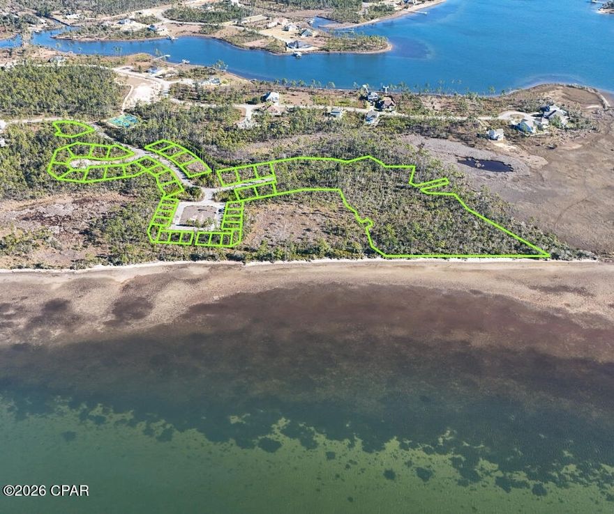 Welcome to Phase Two of Laird Point, a rare waterfront development opportunity in Panama City, FL. This gated community includes 38 platted lots with paved roads and city water and sewer already in place, headlined by substantial undeveloped acreage with Conceptual Site Plans illustrating future development potential of up to 148 total lots, including 30 waterfront lots. The roads, dedicated common areas and amenities also convey with the sale, giving the new developer a blank canvas to add a pool, clubhouse, pier, walking trails and more. There is currently an active HOA for Phase One and the HOA for Phase 2 is inactive. Laird Point offers glowing waterfront sunsets, mature pine trees, and an abundance of natural beauty making a serene and private sanctuary. All lot lines shown in pictures are approximate and for demonstration purposes only. Buyers to confirm all information. Don't miss this once in a lifetime opportunity and come see the property today!