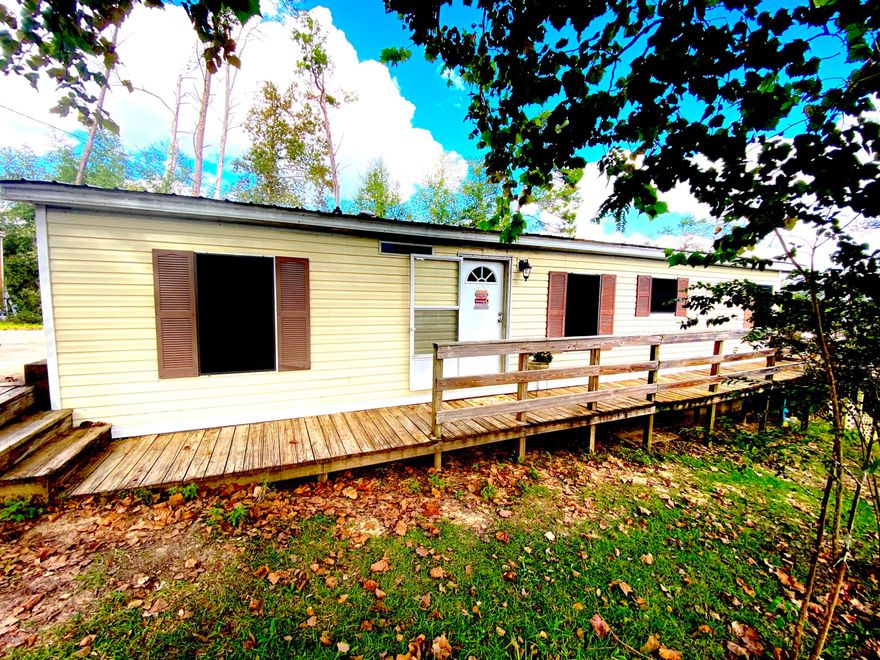 'CURRENTLY UNDER CONTRACT, SELLER ACCEPTING BACKUP OFFERS'

HOMESTEAD OR WEEKEND GETAWAY CLOSE TO CRYSTAL LAKE! Here's your RARE chance to own a home with a full back-porch water view on Spring Pond. This home is about 2 miles away from the highly desired CRYSTAL LAKE so you could bring your boat and launch it at the public boat ramp for water sports & swimming.  The home has a new shed, a shed built in under the home with a concrete floor, a chicken coop, a paved driveway with plenty of parking, & large covered back porch. The home also features a fenced back yard. The property is cleared to the water. Check it out and envision all the ways you could add your own personal touches to make this property shine. Buyer to verify permissions on Spring Pond.