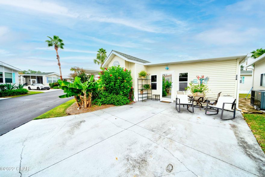 CURRENTLY UNDER CONTRACT, SELLER WILL CONSIDER BACKUP OFFERS - PRICED TO SELL! Located in Emerald Pointe Resort, this MUST SEE home feature an open floorplan, a large living area, 3 bedrooms with one being a nice size master addition, 2 bathrooms, a laundry room, and a large bonus room currently being used for storage. Recent updates include NEW METAL ROOF installed 7/2023, LVP flooring and updated Mini Split AC in the living room. Some furnishings are negotiable if interested. Emerald Pointe Resort is a golf cart friendly, gated community located in the heart of Panama City Beach close to restaurants, shopping, and the world's most beautiful beaches. Amenities include large clubhouse, exercise room, 2 pools (one heated seasonally), hot tub, lake with boardwalk, and shuffleboard court. HOA fee includes water, sewer, garbage, cable, and lawn service. All information is approximate & should be verified.