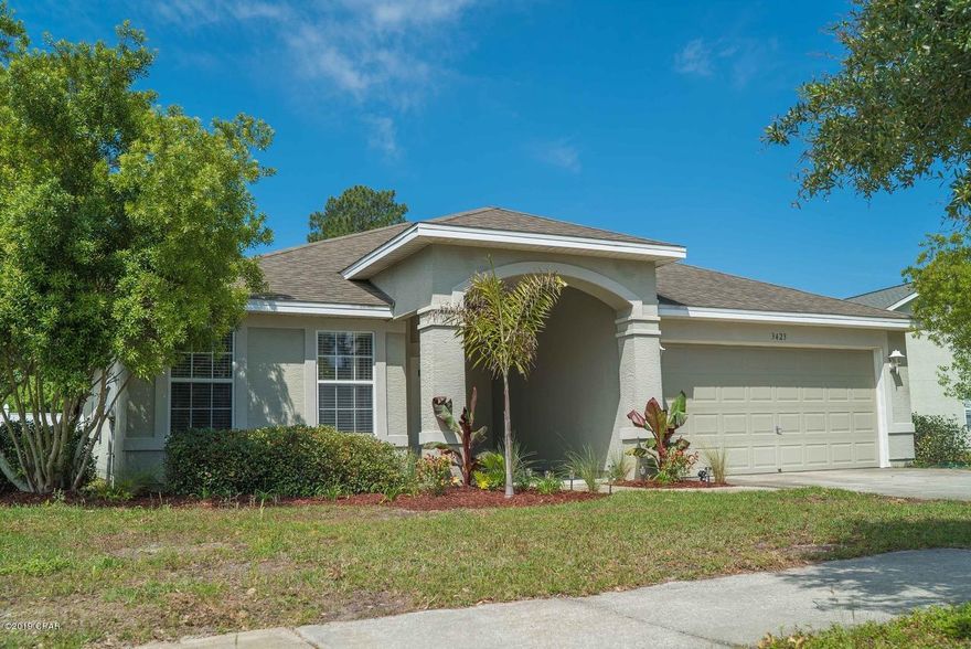 Close to Tyndall AFB and NSA Panama City, this charming 3/2 home in the family friendly community of The Hammocks is perfect! The home features an open concept living area with a beautiful, high vaulted ceiling, a split floor plan, and a fenced back yard. The Hammocks features a community pool, well maintained sidewalk throughout, and is within walking distance to Mosley High School and Bay Haven Charter Academy for K-8. The community's convenient location in Lynn Haven also puts you within minutes of your choice of shopping and dining! Recent upgrades not yet pictured include new ceiling fans in additional bedrooms, all stainless steel appliances, and brand new luxury vinyl tile flooring just installed in the master bedroom.