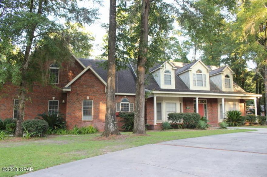 Large 2 story 5/4 family home located on Indian Springs Golf Course. 5000 +/- sf H/C  has plenty of room to grown in. Downstairs has a large living room with wood burning fireplace that has a gas starter, oak flooring thru out, a large walk in storage closet (double doors, shelving, H/AC vents), two ceiling fans, wired for surround sound, large in wall television set. Formal dining room has bay window, a pass thru the Butler's pantry (plenty of shelving for china & glassware) into the large gourmet kitchen. Tile flooring flows thru kitchen into breakfast room. Large thermador gas stove & exhaust vent with flat top griddle, grill, & burners. Separate KitchenAid double oven/convention. Triple stainless steel sink. See more remarks... Center island with vegetable washing station & garbage disposal, Maytag dishwasher &  trash compactor.  Plenty of Oak cabinets & counter space, built in bookshelves, lazy susan & breakfast bar. From breakfast room, first set of stairs leads up to a large library & a large unfinished bonus room. Next to stairs, a hallway (tile flooring thru to laundry room) that leads to Master Bdrm & large laundry room. Off kitchen, a separate large walk in pantry that has H/AC vents, well lit, & tile flooring.  Coat closet next to side door entrance into home & access into garage (could be used as a mud room). Step down into double car garage with auto opener, 2 electric panels(200 amp service), extra water line for an additional refrigerator, Variable speed air handler. Downstairs large master bedroom has plenty of room for king bed and over sized furniture, carpeted & ceiling fan & door to enter into screen porch . Large whirlpool tub & 2 separate his/hers sinks w/ oak cabinets in Master Bath. Large separate tiled shower with glass blocks. From there, flows into very large master closet, which can also be accessed from hallway, has oak flooring, builtin cabinets, drawers and shelving & 2 H/AC vents. Under 1st set of stairs, room for desk. Storage closet with double doors. Laundry room has mop sink with above & below cabinets and built in folding table with under storage drawers & cabinets on both sides. Outside entrance, layered decks, will lead to a concrete driveway to enter thru the double doors into the 30x30 basement/workshop on a concrete slab which is insulated. Houses one of the gas water heaters, well tank with filter, an additional electric circuit breaker panel. There are two sets of french doors to enter into rear of the house screen porch.  Plenty of room for outside entertaining and is plumbed for outside kitchen. 3 ceiling fans, GFI, gas hookup, tile flooring, exit door to small deck & stairs to fenced back yard. Access to electrical room behind in wall television (internet ports, phone, cable). Additional downstairs bedroom off living room, berber carpet, ceiling fan, bay window, has private & guest access to bathroom. Second set of stairs lead to 3 bedrooms & two additional bathrooms. First bedroom top of stairs has walk in closet & access into walk in floored attic which also passes thru to the library. Middle bedroom with private bath, tub shower combo, closet with gas water heater & separate large walk in closet.  End bedroom is large in size with sitting room area, private bath & large walk in closet. In the storage attic, the HVAC systems are in a separate room. There is access to one of the internet access line, additional electric panel, and a TV antenna. This brick & hardy board home does have 3 HVAC systems, 2 gas water heaters, owned under ground 100 gallon propane tank, alarm system, smoke detectors, custom blinds, gutters, built in NuTone music intercom system in all rooms built in ceiling speakers, built in phone & cable jacks in all rooms, recess lighting thru whole house and double insulated windows. Rocking chair front porch.  Landscaped with flowering bushes & fruit trees. A circular driveway. Access to golf course. Upstairs Bedrooms and Bath rooms have had a recent facelift in 2017, new paint & fixtures.