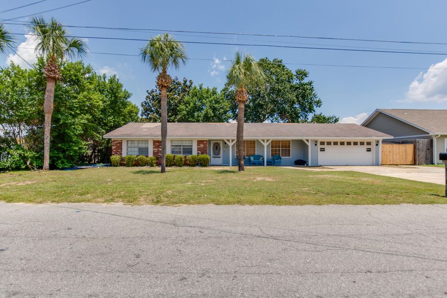 CURRENTLY UNDER CONTRACT, SELLER ACCEPTING BACKUP OFFERS on this 3 bed/2 bath home is located in Open Sands, a quiet, golf cart friendly neighborhood only a few minutes walk to the Gulf and the shops & eateries of Pier Park! This spacious home has central open floor plan which opens to an enclosed Florida room, making it great for entertaining. The bedrooms and closets are roomy. The kitchen has an abundance of storage space and opens to the adjoining dining area, and great room. The attached 2 car garage provides plenty of storage complete with workbench. The home is situated on a double lot with lime tree. Roof replaced in 2019, Water Heater replaced 2018, and A/C replaced in 2017. Call today for your showing!  Being sold as is. Sizes are approximate, please verify accordingly.