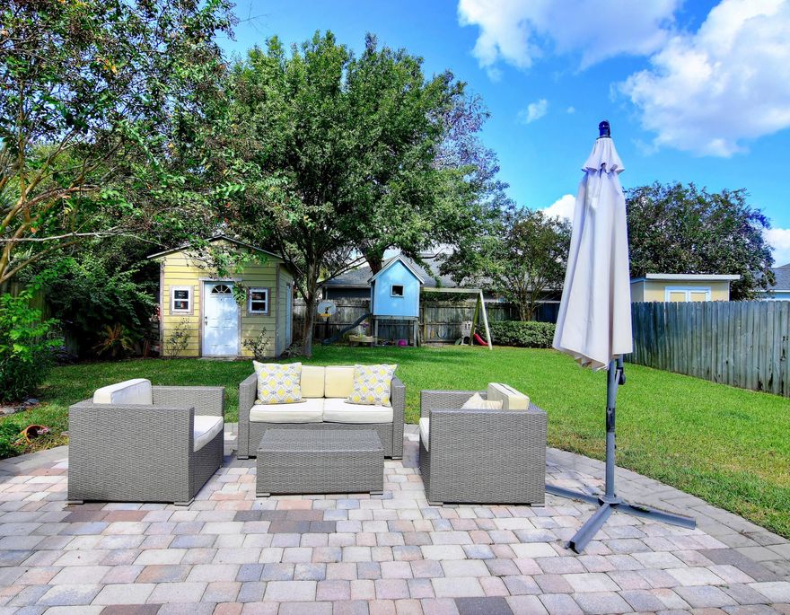 Cute stucco home in Open Sands neighborhood. Only about two blocks to the beach. Lots of new construction in neighborhood and values are increasing! 3 BR's, 2 baths plus bonus room where seller enclosed garage to give total of 1,530 sq ft. Seller kept garage door rails and other parts so new owner can easily convert back to a garage if they choose. High vaulted ceilings and lots of natural light makes this home seem even bigger than what it is.  Large patio in back and big 50x130 lot with nice yard building for extra storage. Convenient location close to beach and about 1.5 miles to pier Park. Make an appt. to see this one.