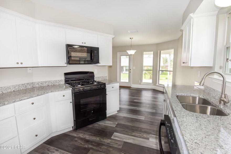 CURRENTLY UNDER CONTRACT, SELLER ACCEPTING BACKUP OFFERS. Welcome to this beautiful, completely renovated home in the desirable subdivision of Shadow Bay. This 3 bedroom, 2 bath has luxury vinyl plank flooring throughout the entire home. Dining area has bay windows that overlook the backyard. The kitchen and bathrooms are complete with granite countertops. Master bedroom includes ensuite bathroom and bay windows. Nice large backyard, great for entertaining and plenty of space for a pool and family fun. All info and measurements are approximate and must be verified by the buyer.