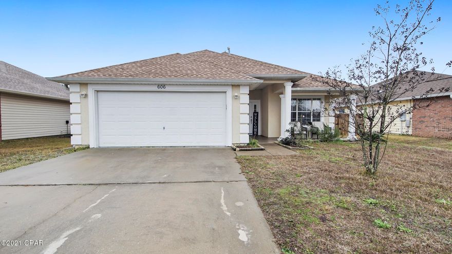 Tastefully remodeled home in very desirable Lynn Haven. Located close to shopping centers however still very quiet. This home features a new roof, new water heater, New A/c, High end gas appliances and fire place. Large walk in closet. Upgraded epoxy flooring in the garage. Fresh paint inside and out. This home also features a large covered front porch and covered back patio. Come enjoy the spacious back yard. This home is a must see!