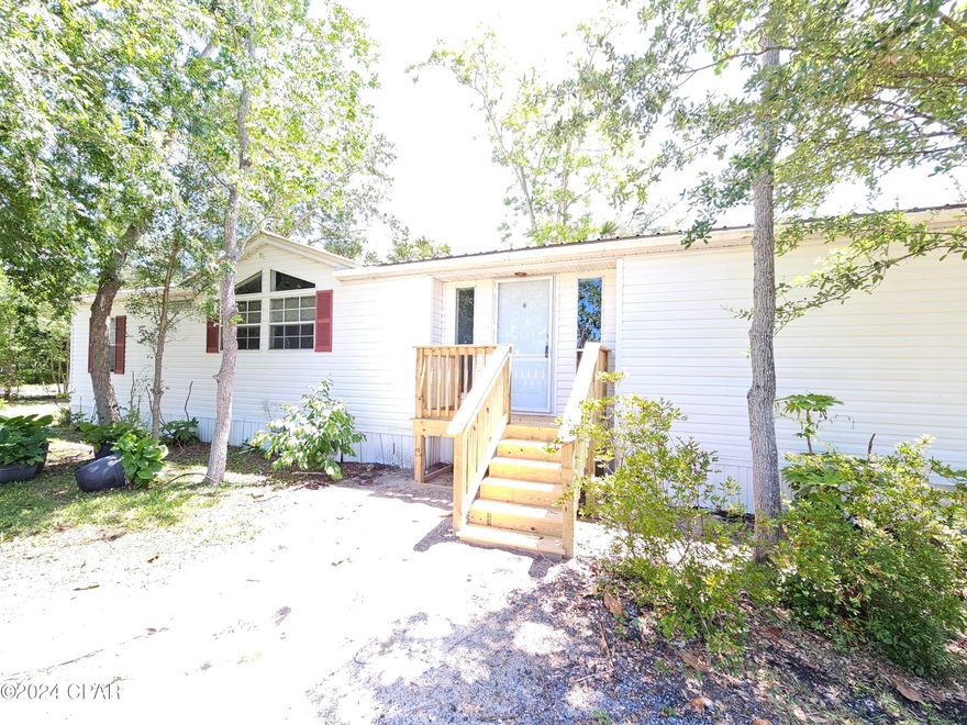 Make your offer! Great Location! Additional land was just added to this 3-bedroom 2- bath home almost an acer of land with three-yard buildings. The lot adjacent to the left is included. This property is close to everything you need including boat ramps. The home is a fixer upper but offers lots of living space with open floor plan including a large kitchen, living room that comes with a fireplace. house comes with all appliances including washer & dryer. Bedrooms are large and the master bedroom bathroom offers both garden tub and a separate shower. Outside you have so much opportunity to be had in this yard. With some TLC this could be your next home or investment or flip. If important all information and measurements should be verified.