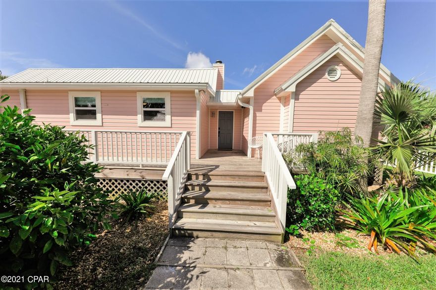 Incredible opportunity to own this Florida Cottage with 340 ft. of frontage on Pratt Bayou, situated on a .34 -acre lot. The house features the charm of a cottage with heart of pine floors, with all the modern conveniences. Minutes to St. Andrews Bay, East Bay and 20 minutes to Shell Island and the Gulf Pass. . The 2 bdrm, 2 bath home offers a new metal roof, dual pane windows, HVAC, irrigation system on well with new pump, 125' dock with slip and observation deck, led yard lighting and custom WIFI-enabled shades in the great room. The roofed and screened porches extend the length of the house and offer additional entertaining space, access, and outstanding views of St. Andrews Bay. The dock has led lighting, deck box, and 20'x24' boat slip at 4-6'water depth. All impeccably maintained.