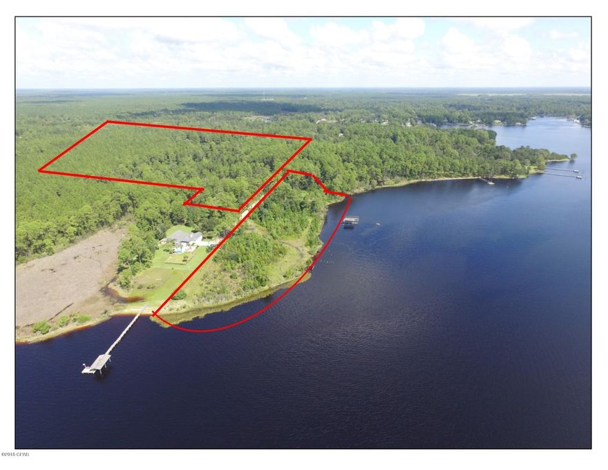 Beautiful waterfront acreage on North Bay and Fanning Bayou. Approximately 775' Bay front. Zoning allows for five units per acre (Zoned R5-A, Unincorporated Bay County). Great site for a waterfront residential subdivision. The seller has conceptual site plans (attached) to include 9 waterfront lots and 28 interior lots. Other concepts include a marina with dry storage, with +/-42 wet slips, condominium or multi-family housing. Many possibilities and opportunities. There is approximately 5 acres of isolated wetlands which should not interfere with most development projects. Copies of the survey and site plans are attached.