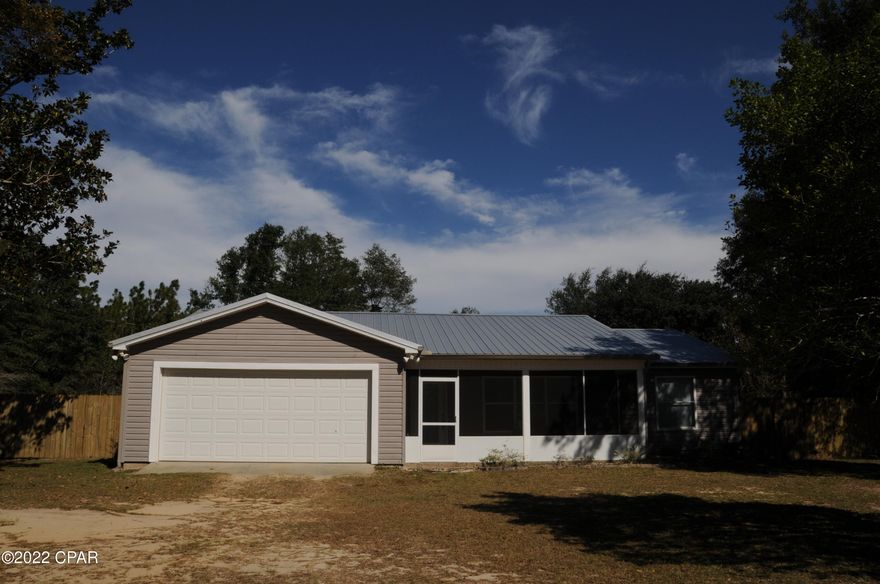 Hurry this will not last long. This beautiful country home is situated on 2.28 acres with plenty of room for an active family. This home has a wonderful open floor plan with a split bedroom plan giving plenty of privacy. The primary bedroom has a bathroom with a sperate shower jacuzzi tub  and walk in closet.  This home has a lot of up grades and is move in ready. New Metal roof,  6 foot privacy fence in  front and one acre  chain link fence in the back , and Starlink can convey with home. The seller is offering a 5,000 dollar contribution towards closing costs or rate buydown with a full price offer.