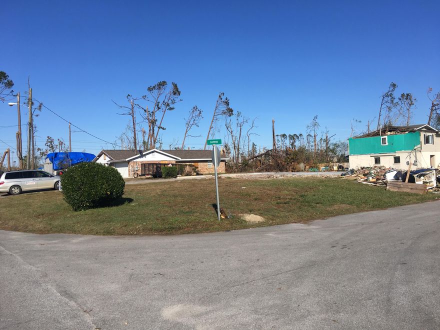Fantastic corner lot, High and dry, NO HOA, electrical, city water, city water city sewer home sustained Hurricane related damage and was demolished. Slab is still present and in good shape.
