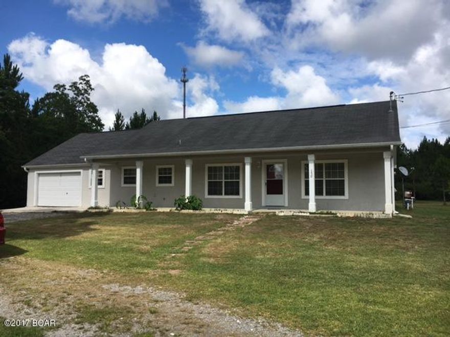 Great Spacious Home in the Country! Very Convenient to Tyndall AFB, shopping, fishing and entertainment! Nice and roomy home with plenty of room for horses and your very own spring fed pond for your fishing pleasure! Home features large master suite with sitting or office area, 3 additional bedrooms, and a bonus room upstairs which could be another bedroom!