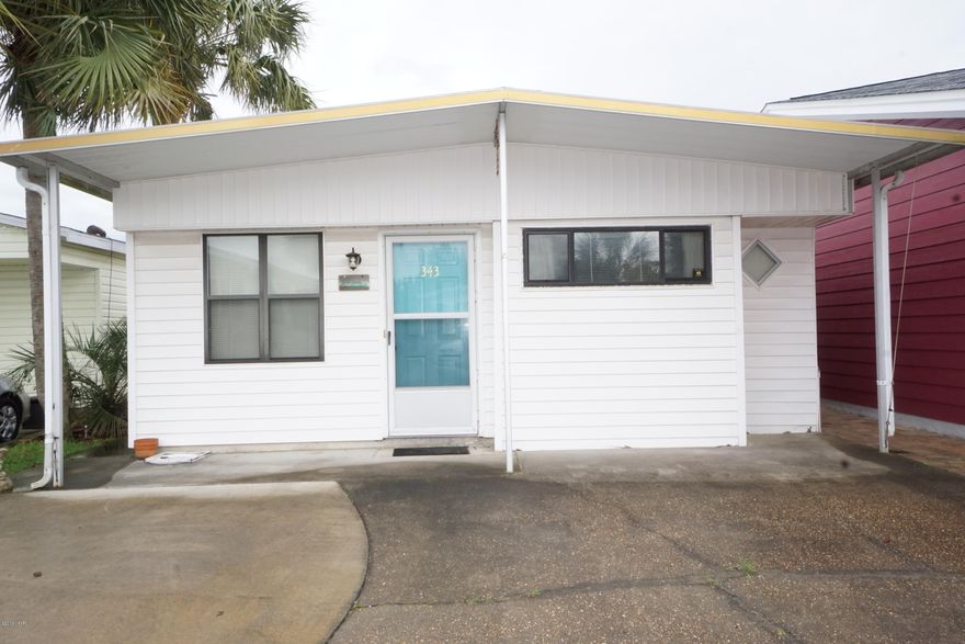 Check out this 2 bedroom 2 bath Venture Out home! Wonderful location within the resort. Great potential here for investment or 2nd home.  Venture Out has 300' on the beautiful pristine beaches of the Gulf of Mexico and 1,000' on the Grand Lagoon. Venture Out has something for everyone. With two salt water pools (one heated), fishing pier, boat ramp, mini golf, children's play ground and much more.