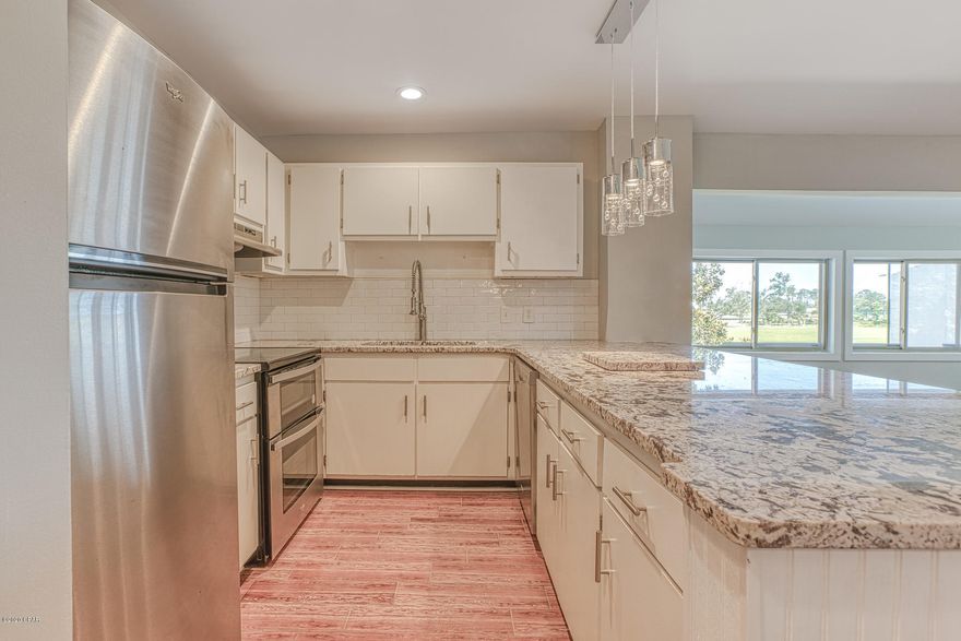 ** OWNER FINANCING AVAILABLE ** Move-In Ready Condo in Bay Point! This condo features an open floor plan,  stainless steel kitchen appliances including a double oven, granite countertops, renovated bathroom and modern light fixtures.  Wonderful for primary living or a second home. Enjoy living in the peaceful gated community of Bay Point, with tennis, golf, parks, restaurants, and close to all Panama City Beach has to offer.  This unit is located in close proximity to the clubhouse at Bay Point Golf Club that has the only Nicklaus Design course in Northwest Florida with brand new tiff eagle greens.  Although the marina was damaged during the hurricane, final approval has been given to rebuild the marina that will dock some of the most luxurious yachts in the area! Call today for your private tour... this condo is ready for you! Washer and dryer included. 
  
**All measurements and information deemed correct, please verify if needed. Buyer and Buyers Agent to verify all association fees with HOA**