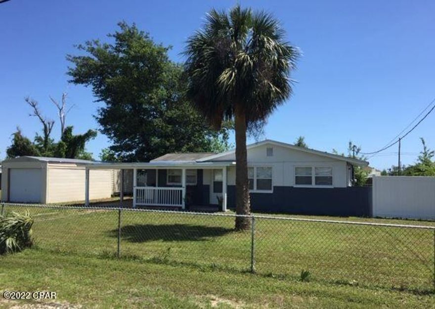 3 bedroom 2 bath cement block house. Large fenced in lot with room for a large garden or pool. New roof, electrical and panel, doors and windows installed in 2015'. New white wash plank flooring installed in 2017'. New granite kitchen and cabinets in 2018'. New central AC installed in 2017'. New hall bathroom in 2017'. In 2019' a detached metal roof garage was hurricane tied and cemented into the ground. Wired electrical with breaker box, and Laundry outlets. Also full lighting throughout, with garage door. In 2020' a fully remodeled Master bathroom, Laundry and master closet was tiled and completed. In 2022' a new water heater was installed. This house is fully remodeled! It is also under appraisal value. Zillow is Not aware of the complete upgrades or the large newer detached garage and workshop. This property will not last long!!  Located 3 doors down from the new Callaway fire station and sub police station. Near Walmart, restaurants and not far from Tyndall Air Force base. No water bills! House has a great water well !