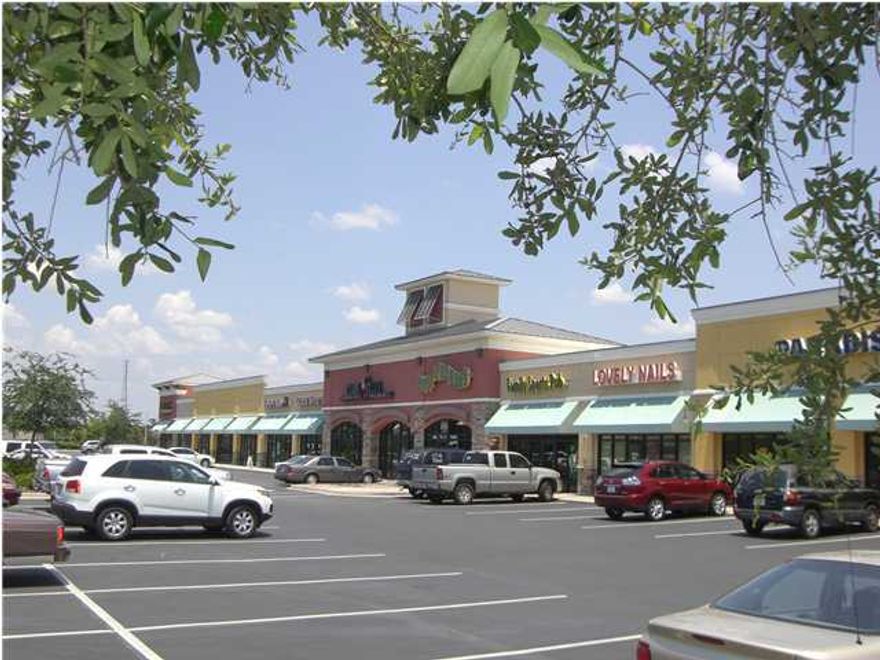 Nautilus Station Shopping Center is centrally-located in Panama City Beach at the northeast corner of Panama City Beach Parkway and Nautilus Street. Approximately 1-mile east of Pier Park and out of the traffic jam. The new access road to Colony Club and Trieste Subdivisions and the Holiday Golf Course recently opened providing residents access to the signalized intersection in front of Nautilus Station. This 1,428 sq. ft. unit is currently occupied by ''Maui Whitening'' and is ideal for many retail uses.  Building and monument signage available.  We also have one building pad remaining and can build up to 3,100 square feet on the pad between Shan Kishi (sushi bar) and Indian Motorcycles. See attached site plans, renderings and elevations of the freestanding building. Will finish-to-suit.