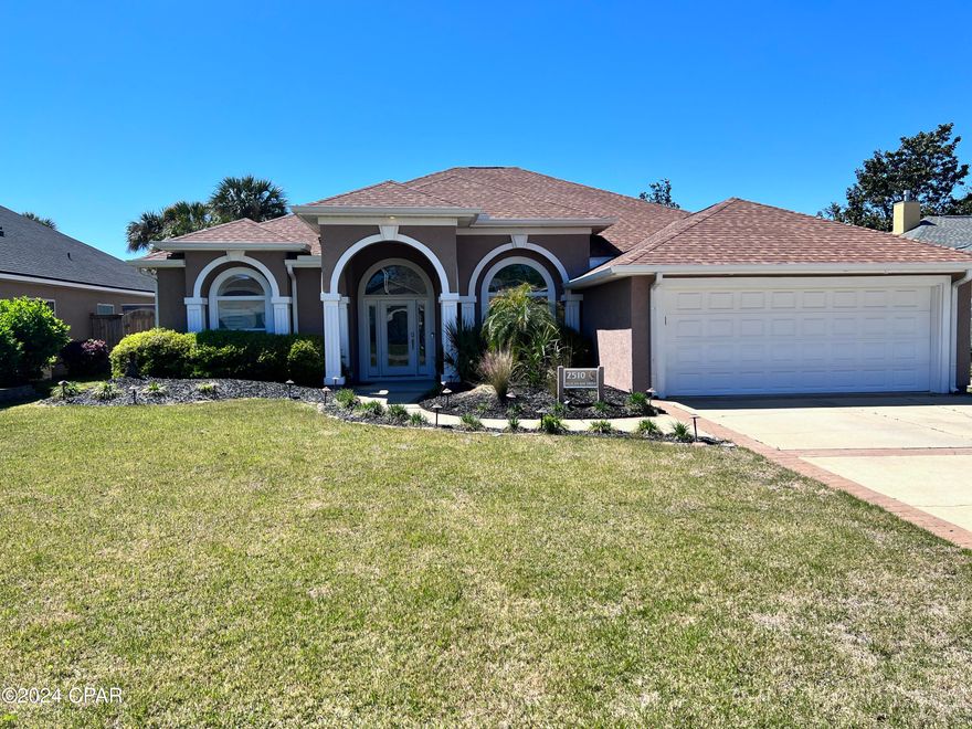 (WOW! seller will finance with 20% down @6% with 3-year balloon pymt.) This gorgeous 4 bedroom 3 full bath home is better than new and ready for a new owner! The interior of the home looks and feels like it was built in 2022. From the grand entrance of the home you will notice the open feel with 12' ceilings in main area + crown molding and the built in entertainment center built around a fireplace. The hardwood floors extend throughout the living room and formal dining room. The eat in kitchen has custom cabinets, solid surface counter tops, a quality stainless appliance package, stainless oven hood and a MASSIVE pantry. For casual dining there is an eat in area as well as a breakfast bar in the kitchen. The bedroom plan is split. The main bedroom has double walk in closets,

a HUGE jetted tub, loads of cabinet and counter space, double vanities and a separate shower. Bedrooms 2 and 3 are split from the main bedroom and share a bath. Bedroom 4 is a more private bedroom with a separate bath and easy access to the outside pool and covered patio area. These bedrooms also feature extra storage above the closets. The back yard of this home is the slice of paradise you expect from a home at the beach! The inground pool is perfect for relaxing in the privacy fenced back yard. The covered patio is another living space, making this the ultimate home for entertaining. A two car garage takes care of more storage too! You have to see this house! The community is located on the bay with dock for fishing and community pool for the owners use. Compare to others and you will see the value in buying a perfectly kept, super clean home! Call your Realtor today!