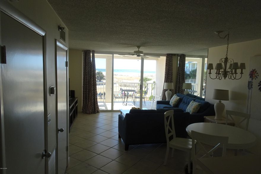 Welcome home to your Magnolia House #202! This Magnolia House condo in Destin Pointe overlooks the Gulf of Mexico and East Pass and is the best kept secret in Destin. This magnificent two (2) bedroom, two (2) bathroom condominium is located inside of the gated island community of Destin Pointe located on prestigious Holiday Isle, and is perfect as a permanent residence, or vacation rental. The condo's front entry lanai is enclosed by a wall of functional louvers, which can be opened or closed and provides ideal place to keep shoes, rafts, coolers, and anything else you don't want to store inside. This condo is being sold fully furnished including all electronics. Condo was recently updated with new furnishings, and paint. From your balcony, you can view incredible sunsets, fireworks, and east pass boating. 
A newly constructed pool is located just down from your balcony. A tram service is available to take you and your guests from the parking deck to the Gulf or one of two community pools. You can walk or take the tram to the jetties for snorkeling or fishing.
Amenities include 3,000 feet of beach for owner's and their guests, two (2) swimming pools, two (2) lakes with walkover and gazebo, convenient owner parking garage, lighted tennis courts, and more.
Once inside the gates of Destin Pointe one will think they are in one of the peaceful islands of the Caribbean, yet just a short distance is shopping, restaurants, boating and all Destin offers.