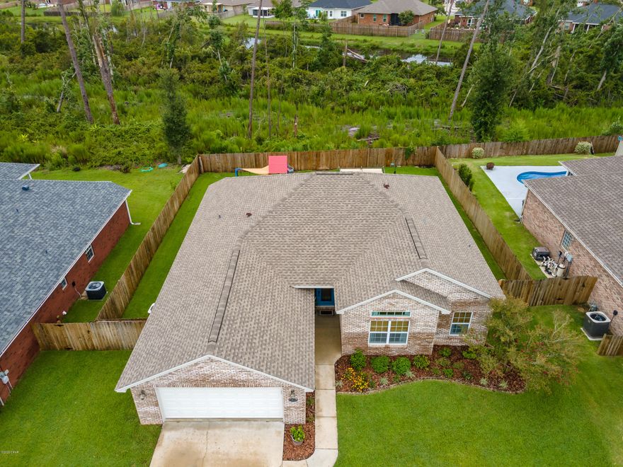 Don't miss out on this all brick single story home in highly desirable Camryn's Crossing! The open and bright plan features 10' ceilings and has been tastefully updated with luxury vinyl plank flooring, custom kitchen cabinetry, stainless appliances and quartz counter tops. The expansive master retreat features a sitting area, spa-inspired bath and over-sized walk in closet.  Take advantage of low-maintenance with full brick and a new roof. Enjoy relaxing and entertaining outdoors on the covered back porch overlooking your private fenced back yard. Schedule your tour today!