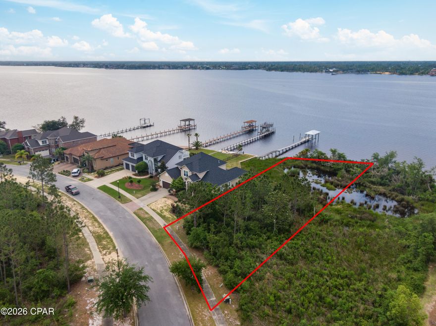 This is an opportunity to own a piece of paradise. This lot has frontage on North Bay. It is just a few feet from Highway 77 and a short drive to downtown Panama City, and Lynn Haven.