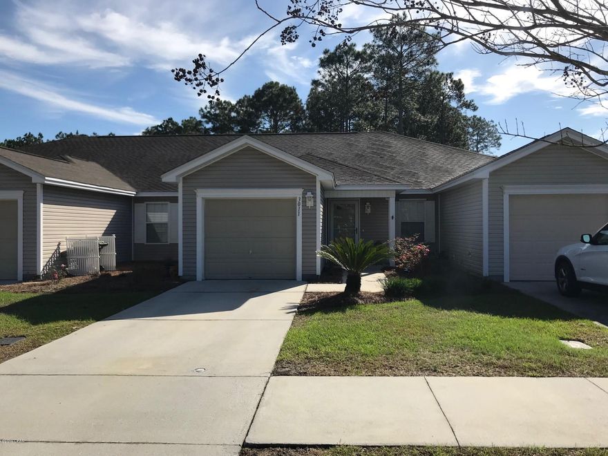 Great two bedroom two bath unit in the highly desirable Hammocks town home subdivision. Situated on a desirable cul de sac with lots of green space to enjoy. This well maintained home is close to schools, shopping and hospitals. Within walking distance to Mosley High School and the Bay Haven Charter Academy, you are only 25 minutes away from Tyndall AFB and the Navy Base. The grounds are professionally maintained by the association and always have that just manicured look. This is a great home in one of Lynn Haven's best neighborhoods. See it today because these homes move quickly. All sizes are approximate, please measure to be sure.