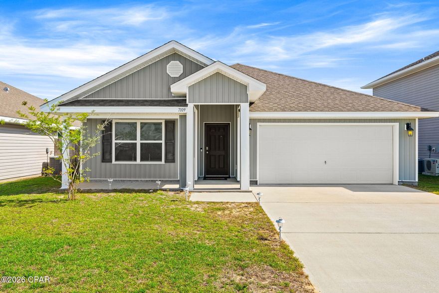 Welcome to 7109 Penn Way, a beautifully designed 4-bedroom, 2-bath home located in the Barrett's Park community. Built in 2020 and offering nearly 1,800 square feet, this home features a thoughtfully designed split-bedroom layout paired with an open-concept floor plan that creates the perfect balance of comfort, functionality, and modern style. Situated on a quiet side street with no through traffic, you'll enjoy a more private and peaceful setting while still being close to everything.  Convenience is one of the standout features of this location. You're only a short drive from Tyndall Air Force Base, local shopping, dining, and the beautiful beaches of Panama City. Nearby everyday essentials include a newly built Starbucks and Publix Super Market just minutes away. With its combination of a great price, upgrades, space, and location, this property offers exceptional value compared to many newer construction homes currently on the market.

Inside, the spacious living and dining areas flow naturally into the kitchen, making the home ideal for entertaining or everyday living. The kitchen is equipped with a large center island, generous counter space, and a walk-in pantry that provides plenty of storage. Whether you're hosting friends or preparing family meals, this layout keeps everyone connected.  The primary suite is privately positioned toward the back of the home and includes dual vanities, a large walk-in closet, and a separate soaking tub and shower for a relaxing retreat. The additional bedrooms are located on the opposite side of the home, offering flexibility for guests, children, or even a home office setup.  Out back, you'll find a covered patio overlooking a spacious fenced-in yard with plenty of room for pets, outdoor gatherings, gardening, or simply enjoying the Florida weather in your own private space.  You don't want to miss the chance to check this one out!  All measurements are approximate and should be verified if important.