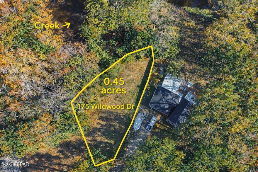Discover Old Florida charm at 175 Wildwood Dr, Freeport, FL. This nearly ½-acre cleared lot sits at the end of a quiet street in the Black Creek area, offering excellent privacy and a peaceful canal setting. Surrounded by mature live oaks and magnolias, the property is just steps from Live Oak Landing and provides a serene natural backdrop. Located in fast-growing Freeport, this lot offers both tranquility and future potential, with convenient access to South Walton and just a 20-minute drive to Blue Mountain Beach. An ideal opportunity to build your dream home or getaway in a beautiful, private setting.