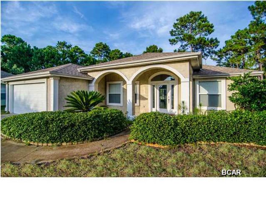 This is a MUST SEE - MOVE IN READY HOME! Super clean 4 bedroom 2 bath home located in desirable and family friendly subdivision of Hidden Pines (no HOA fees!), convenient to Navy Base, beach, popular restaurants and other amenities. A great open floor plan home, with high ceilings in the main living areas creates a real sense of space. This home has a spacious kitchen with dining nook, breakfast bar and all new stainless steel appliances; large great room with corner fireplace. The master suite is complimented by the recently remodeled luxury master bath with separate whirlpool tub and shower, double vanities and walk-in closet. The other three remaining bedrooms provide ample space for family or friends. All common areas have a nice neutral tile and all bedrooms have blinds and