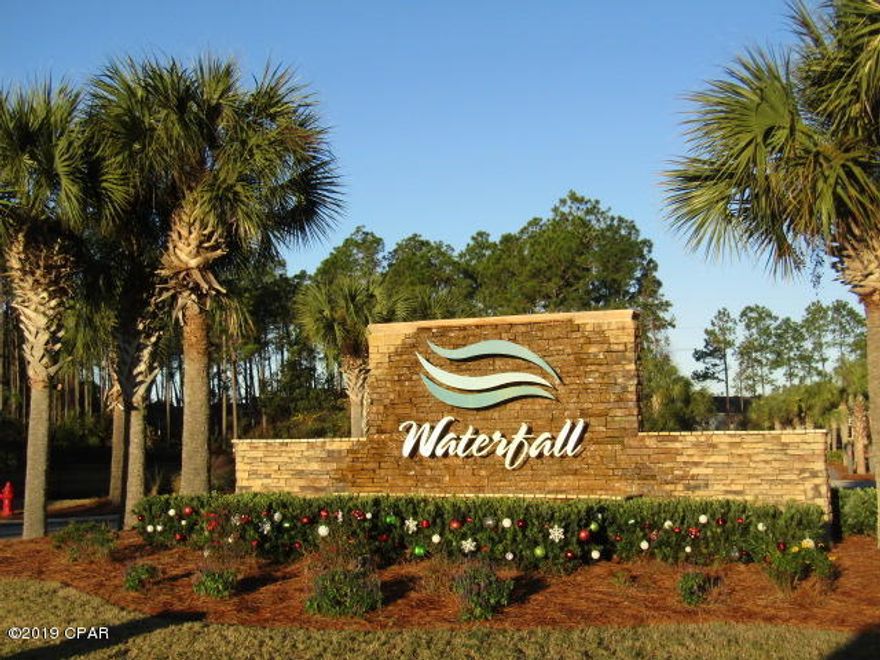 WATERFALLS - 3 bedroom, 3.5 bath 3 story end townhome. Elegant townhome features 2 master suites on the 3rd floor. Front suite features large bathroom with jacuzzi tub and stand alone shower. 2nd floor has spacious living room, 1/2 bath, open kitchen, dining area leading to balcony and large laundry room with washer and dryer. 1st floor features studio apartment with large closet, stackable washer and dryer and full bath. French doors lead to patio area. Mini frige 'AS IS'. 1 car garage. Lawn and trash service provided by HOA. Community features club house and swimming pool. Convenient to beaches. Dogs only. *$500 dep/$50 pet fee/$$25 pet rent.