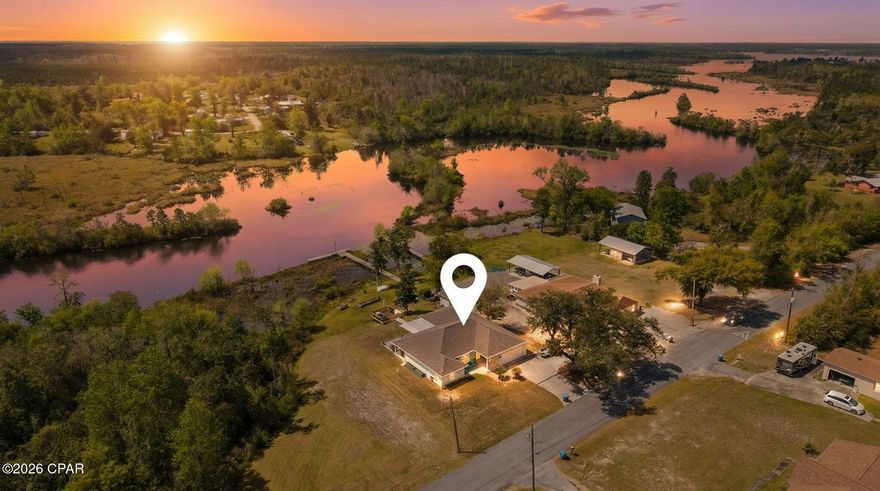 WATERFRONT - Looking for a home that offers a true waterfront lifestyle? Welcome to The Lake House at 6303 Lakeshore Drive in Panama City, FL. This 3 bedroom, 2 bath, 2,078 sqft. home is perfectly positioned on nearly an acre (.872) with 100 feet of cleared private waterfront on Deer Point Lake, offering the kind of space, privacy, and usability that is hard to find!

From the moment you step inside, you'll notice the care and meticulous condition of the home. The layout features a true split floor plan with spacious bedrooms, all with water views, and a primary suite tucked away for added privacy. Two separate living areas provide flexibility for both everyday living and entertaining.

The oversized kitchen is designed for gathering--featuring abundant counter space, ample cabinetry, and an open flow into the living room and breakfast nook. Additional dining options include a bar seating area and a separate dining space, making it easy to host family and friends.

Step outside and the property truly comes to life. Enjoy multiple outdoor living spaces that including a screened porch, elevated deck for relaxing, covered patio with outdoor dining, and expansive yard, all designed to take full advantage of the waterfront setting. The private dock offers direct access for boating, kayaking, and fishing, while the fire pit area creates the perfect spot to unwind on the cooler evenings. 

With nearly an acre of land, this property provides a level of space and versatility that is hard to find--whether you're looking to entertain, relax, or simply enjoy the outdoors.

This home comes partially furnished and move-in ready, offering an  incredible opportunity to step into waterfront living with ease. If you've been searching for space, privacy, and a true connection to the water--this is a must-see. Schedule your private showing today.

*Note: The property has another 100 ft of waterfront footage that is not cleared to the left of the property.