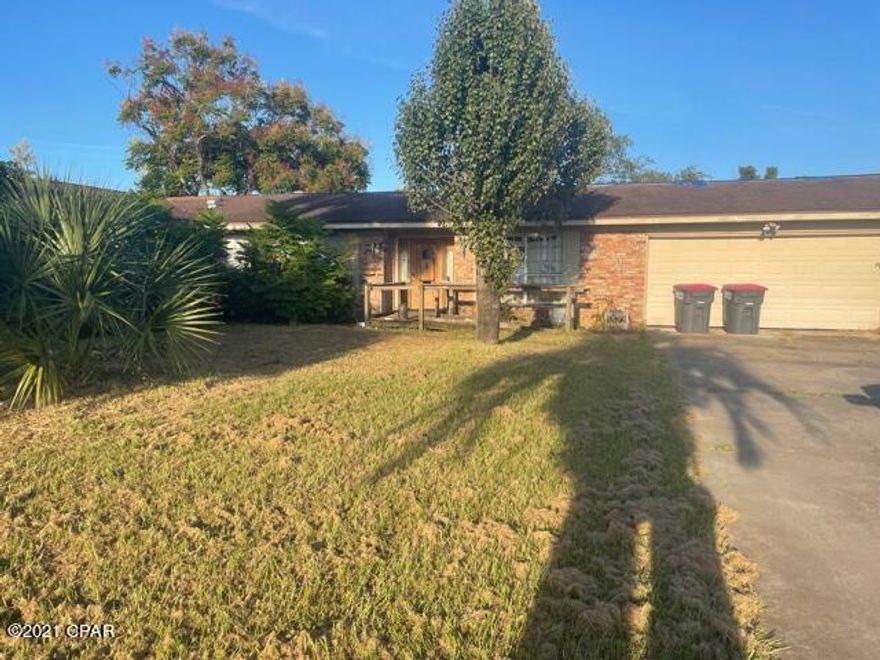 Hurricane Damaged for Sale in the highly desirable Pretty Bayou! This Four Bedroom Two and Half Bathrooms on almost half acre lot in central Panama City is ready for you to make it come to life. This home sits on a Pond with a damaged pool in the back yard. This home won't last long. CASH ONLY. Buyer to verify all measurements and information if deemed important.